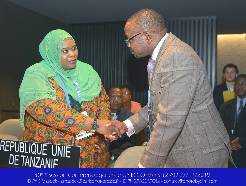 Hon. Minister Riziki Juma shake hands with her counterpart of Zimbabwe during the session